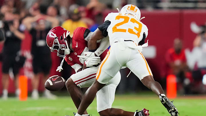 Alabama wide receiver Lotzeir Brooks (17) drops a pass while defended by Tennessee defensive back Boo Carter (23) during a college football game between Tennessee and Alabama at Bryant-Denny Stadium in Tuscaloosa, Ala., on Oct. 18, 2025. Alabama wide receiver Lotzeir Brooks (17) drops a pass while defended by Tennessee defensive back Boo Carter (23) during a college football game between Tennessee and Alabama at Bryant-Denny Stadium in Tuscaloosa, Ala., on Oct. 18, 2025.