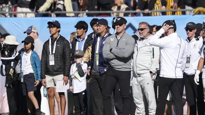 Dec 31, 2025; Tampa, FL, USA; Vanderbilt Commodores head coach Clark Lea looks on against the Iowa Hawkeyes in the third quarter during the ReliaQuest Bowl at Raymond James Stadium. Mandatory Credit: Nathan Ray Seebeck-Imagn Images Dec 31, 2025; Tampa, FL, USA; Vanderbilt Commodores head coach Clark Lea looks on against the Iowa Hawkeyes in the third quarter during the ReliaQuest Bowl at Raymond James Stadium. Mandatory Credit: Nathan Ray Seebeck-Imagn Images