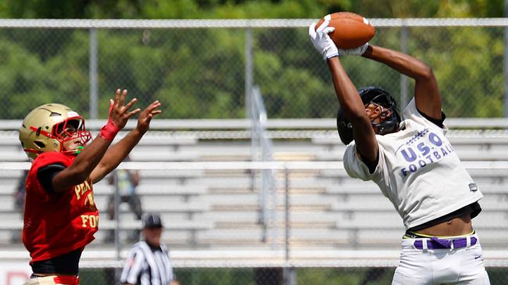 USO's Brayden Clark grabs an interception during a scrimmage with Penn Hills Saturday at Yuhas-McGinley Stadium in Penn Hills. The Wildcats are the defending City League champions. USO's Brayden Clark grabs an interception during a scrimmage with Penn Hills Saturday at Yuhas-McGinley Stadium in Penn Hills. The Wildcats are the defending City League champions.