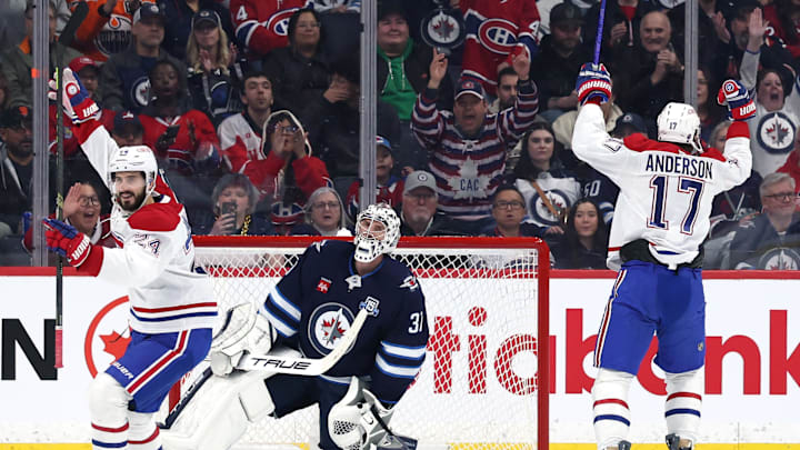 Montreal Canadiens right wing Josh Anderson (17) celebrates a goal against Winnipeg Jets goaltender Connor Hellebuyck (37) in the second period at Canada Life Centre. 