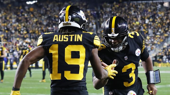 Oct 28, 2024; Pittsburgh, Pennsylvania, USA;  Pittsburgh Steelers wide receiver Calvin Austin III (19) and quarterback Russell Wilson (3) celebrate after combining for a touchdown against the during the fourth quarter at Acrisure Stadium. Mandatory Credit: Charles LeClaire-Imagn Images