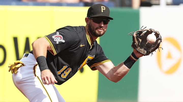 Sep 21, 2025; Pittsburgh, Pennsylvania, USA;  Pittsburgh Pirates third baseman Jared Triolo (19) fields a ground ball for an out against Athletics catcher Willie MacIver (not pictured) during the fourth inning at PNC Park. Mandatory Credit: Charles LeClaire-Imagn Images