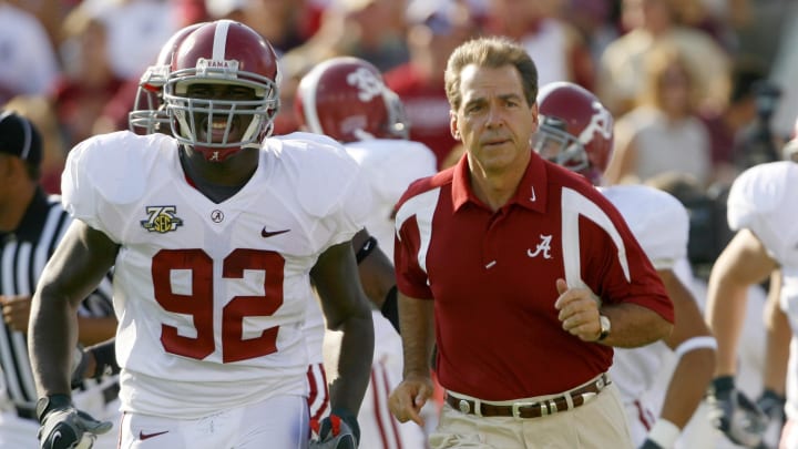 Sep 29, 2007; Jacksonville, FL, USA; Alabama Crimson Tide head coach Nick Saban takes the field alongside Wallace Gilberry for a game against the Florida State Seminoles at Jacksonville Municipal Stadium in Jacksonville, Florida. Mandatory Credit: Jason Parkhurst-USA TODAY Sports Copyright © 2007 Jason Parkhurst Sep 29, 2007; Jacksonville, FL, USA; Alabama Crimson Tide head coach Nick Saban takes the field alongside Wallace Gilberry for a game against the Florida State Seminoles at Jacksonville Municipal Stadium in Jacksonville, Florida. Mandatory Credit: Jason Parkhurst-USA TODAY Sports Copyright © 2007 Jason Parkhurst