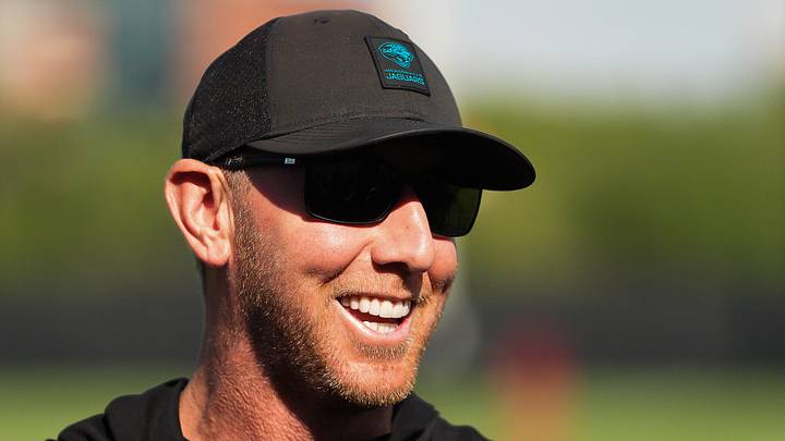 Jacksonville Jaguars head coach Liam Coen laughs with coaches before the Jaguars held their final Organized Team Activity on Monday, June 15, 2026 at the Miller Electric Center in Jacksonville, Fla. [Doug Engle/Florida Times-Union]