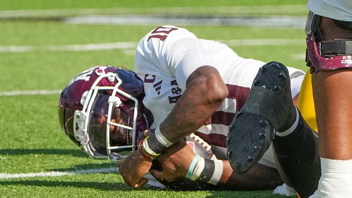 Oct 10, 2026; Columbia, Missouri, USA; Texas A&M Aggies quarterback Marcel Reed (10) is sacked by Missouri Tigers defensive tackle Donta Simpson (8) (not pictured) during the second half of the game at Faurot Field at Memorial Stadium. Mandatory Credit: Denny Medley-Imagn Images