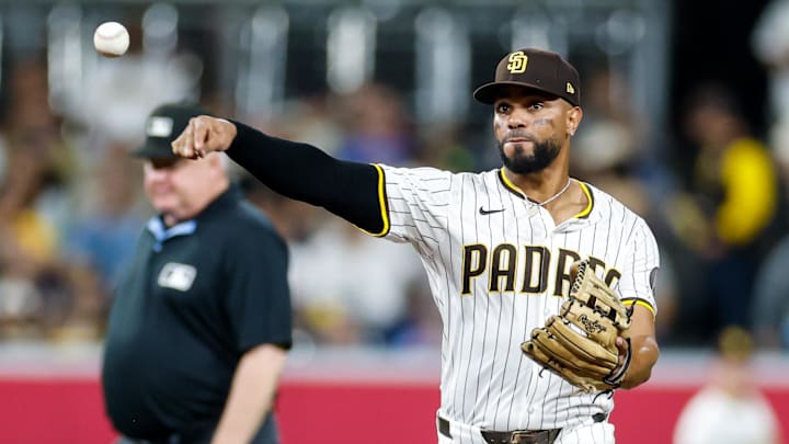 Sep 23, 2025; San Diego, California, USA; San Diego Padres shortstop Xander Bogaerts (2) throws to first for an out during the fifth inning against the Milwaukee Brewers at Petco Park. Mandatory Credit: David Frerker-Imagn Images
