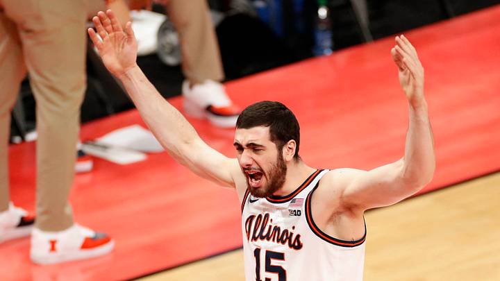 Illinois Fighting Illini forward Giorgi Bezhanishvili (15) throws his hands up to get the crowd hyped during the second round of the 2021 NCAA Tournament on Sunday, March 21, 2021, at Bankers Life Fieldhouse in Indianapolis, Ind. Mandatory Credit: Michael Caterina/IndyStar via USA TODAY Sports Illinois Fighting Illini forward Giorgi Bezhanishvili (15) throws his hands up to get the crowd hyped during the second round of the 2021 NCAA Tournament on Sunday, March 21, 2021, at Bankers Life Fieldhouse in Indianapolis, Ind. Mandatory Credit: Michael Caterina/IndyStar via USA TODAY Sports