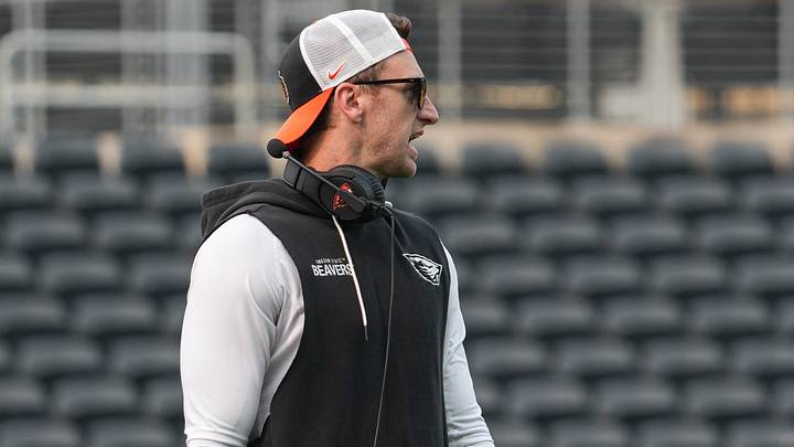 Oregon State co-offensive coordinator and quarterbacks coach Mitch Dahlen runs drills during fall camp at Reser Stadium on Wednesday, Aug. 5, 2025, in Corvallis, Oregon.