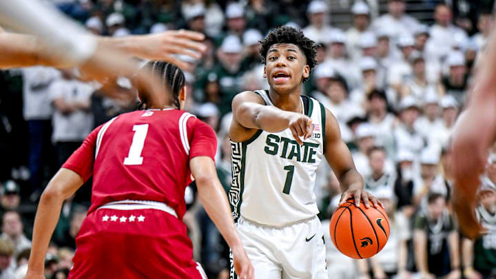 Michigan State's Jeremy Fears Jr., right, communicates with teammates as Indiana's Myles Rice, left, defends during the first half on Tuesday, Feb. 11, 2025, at the Breslin Center in East Lansing.