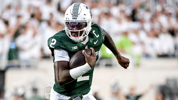 Michigan State's Aidan Chiles runs for a gain against Western Michigan during the second quarter on Friday, Aug. 29, 2025, in East Lansing.