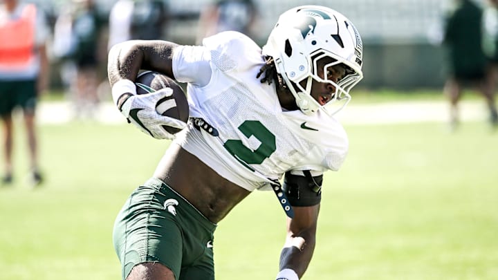 Michigan State's Aydan West runs with the ball during football practice on Monday, Aug. 11, 2025, in East Lansing.