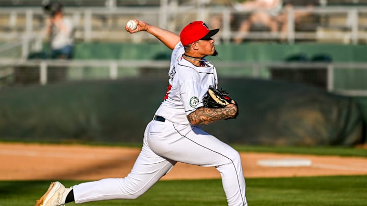 Lugnuts' Eduardo Rivera pitches to a Loons batter during the third inning on Tuesday, April 9, 2024, at Jackson Field in Lansing.
