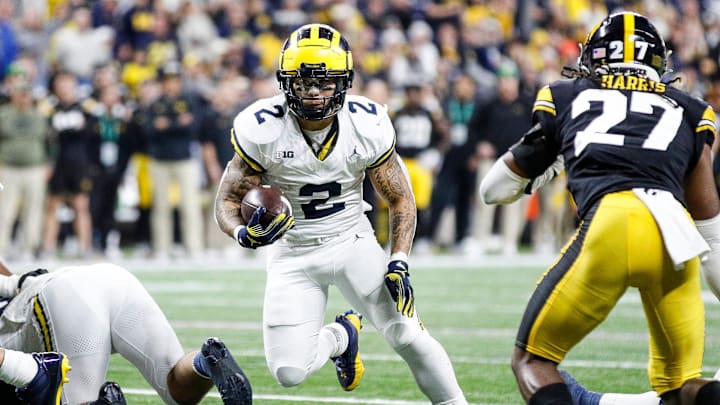Michigan running back Blake Corum runs against Iowa during the second half of U-M's 26-0 win over