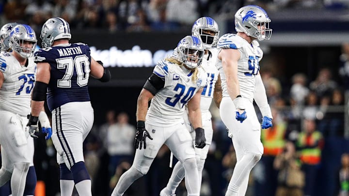 Lions defensive end Aidan Hutchinson celebrates a sack of Cowboys quarterback Dak Prescott during