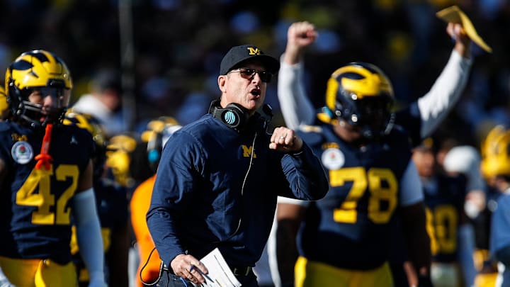 Michigan coach Jim Harbaugh reacts to a play against Alabama during the first half of the Rose Bowl