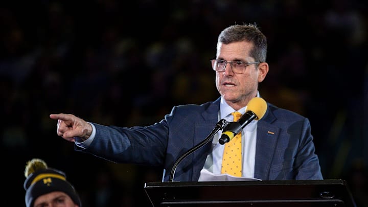 Michigan head coach Jim Harbaugh speaks during the national championship celebration at Crisler