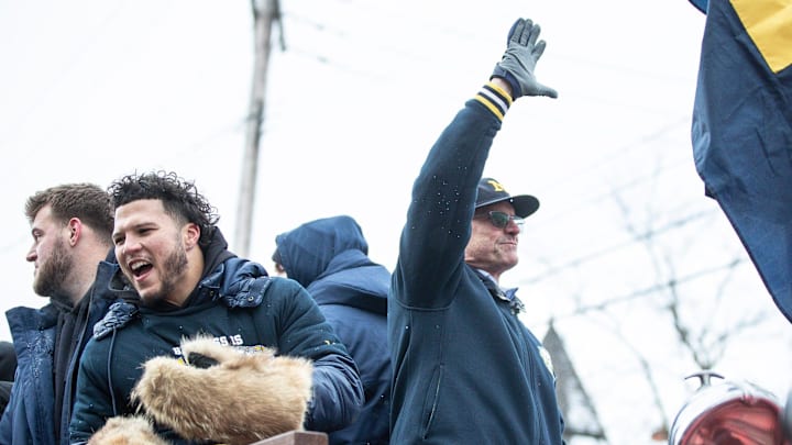 Jan 13, 2024; Ann Arbor, MI, USA; Michigan running back Blake Corum and head coach Jim Harbaugh wave