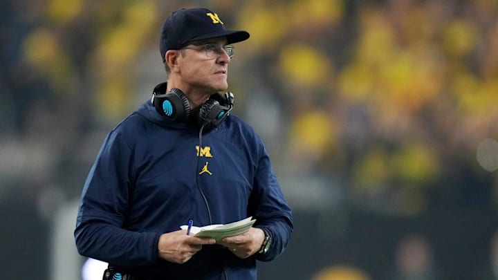 Michigan head coach Jim Harbaugh looks on during the second half of the College Football Playoff.