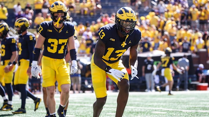 Michigan defensive back DJ Waller Jr. (13) warms up before the East Carolina game at Michigan