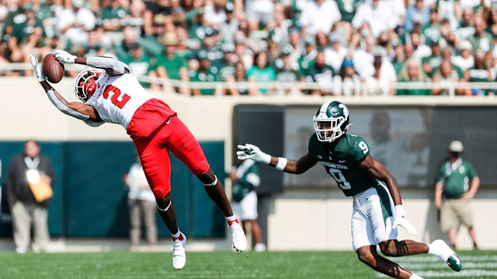 Youngstown State wide receiver C.J. Charleston (2) makes a catch against Michigan State cornerback