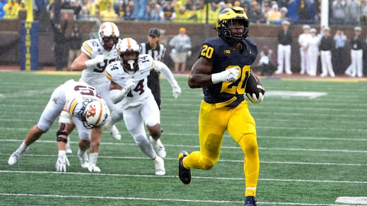 Michigan running back Kalel Mullings runs in for the first touchdown of the game during first-half action between Michigan and Minnesota at Michigan Stadium in Ann Arbor on Saturday, Sept. 28, 2024.