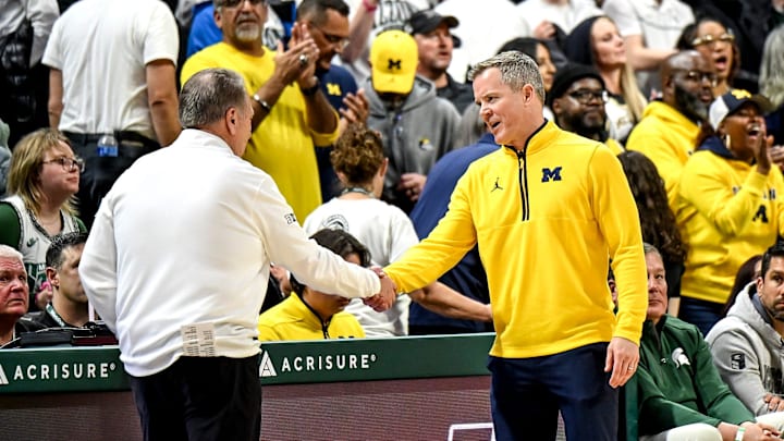 Michigan State's head coach Tom Izzo, left, shakes hands with Michigan's head coach Dusty May after the game on Friday, Jan. 30, 2026, at the Breslin Center in East Lansing.