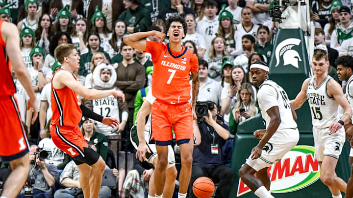 Illinois Will Riley, center, celebrates after a score against Michigan State during the first half on Sunday, Jan. 19, 2025, at the Breslin Center in East Lansing.