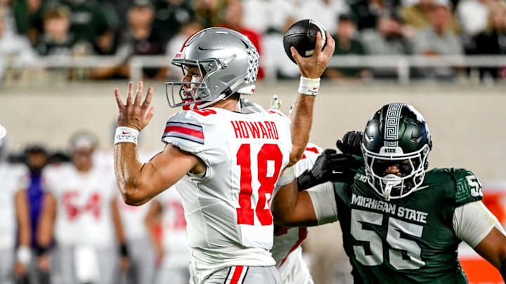Ohio State's Will Howard throws a pass against Michigan State during the first quarter on Saturday, Sept. 28, 2024, at Spartan Stadium in East Lansing.
