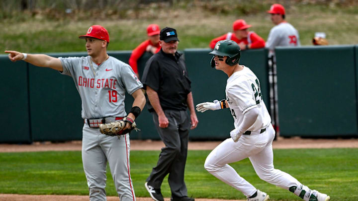 Michigan State's Sam Busch, right, gets to first base after a hit against Ohio State during the fourth inning on Friday, April 18, 2025, at McLane Stadium in East Lansing.