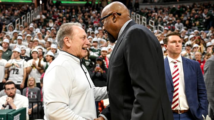 Michigan State's head coach Tom Izzo, left, shakes hands with Indiana's head coach Mike Woodson before the game on Tuesday, Feb. 11, 2025, at the Breslin Center in East Lansing.