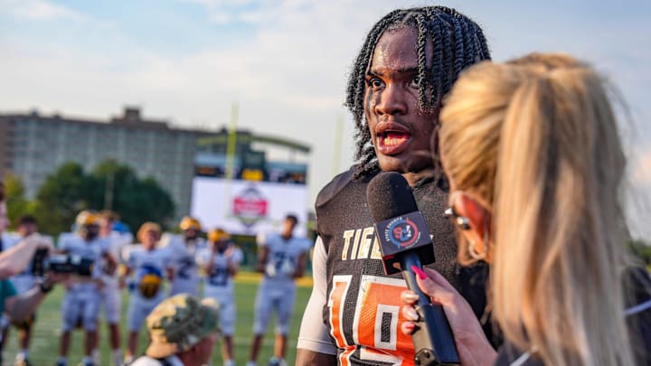 Belleville QB Bryce Underwood is interviewed after defeating Clarkston during the 2024 Xenith Prep Kickoff Classic at Wayne State's Tom Adams Field in Detroit on Friday, Aug. 30, 2024.