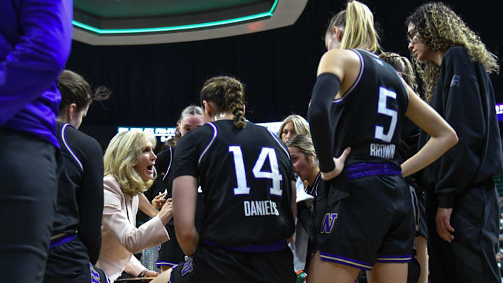 Washington Huskies' head basketball coach Tina Langley coaches her team against the Spartans, Sunday, Jan. 12, 2025, at the Breslin Center in East Lansing. MSU won 80-68.