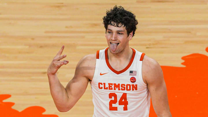 Clemson sophomore forward PJ Hall (24) reacts after making a three-point shot against Wake Forest