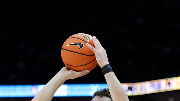 Feb 16, 2025; Columbus, Ohio, USA;  Michigan Wolverines forward Will Tschetter (42) shoots the ball during the first half against the Ohio State Buckeyes at Value City Arena. Mandatory Credit: Joseph Maiorana-Imagn Images