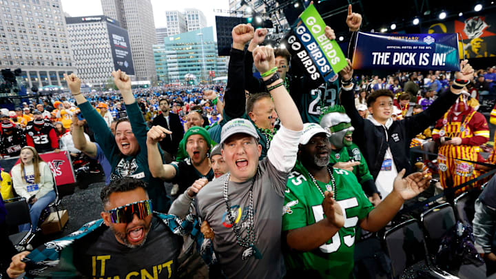 Philadelphia Eagles fans yell as their pick is made in the second round of 2024 NFL draft in Detroit on Friday, April 26, 2024.
