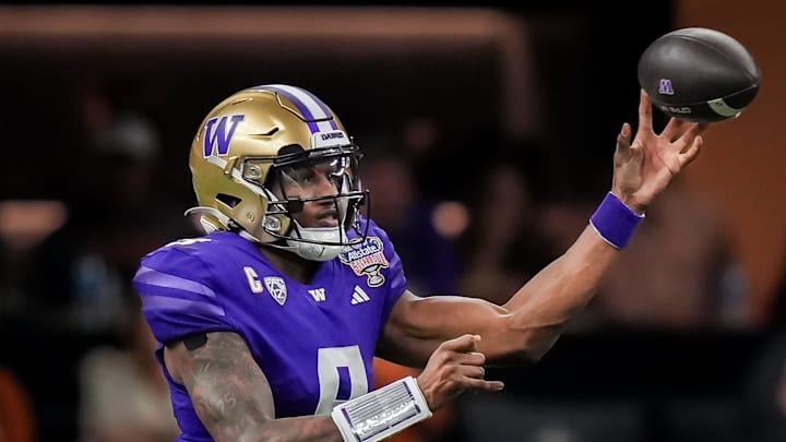 Washington Huskies quarterback Michael Penix Jr. (9) pass the ball during the Sugar Bowl College
