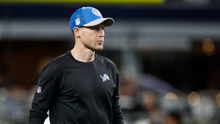 Detroit Lions offensive coordinator Ben Johnson watches warm up before the Dallas Cowboys game at