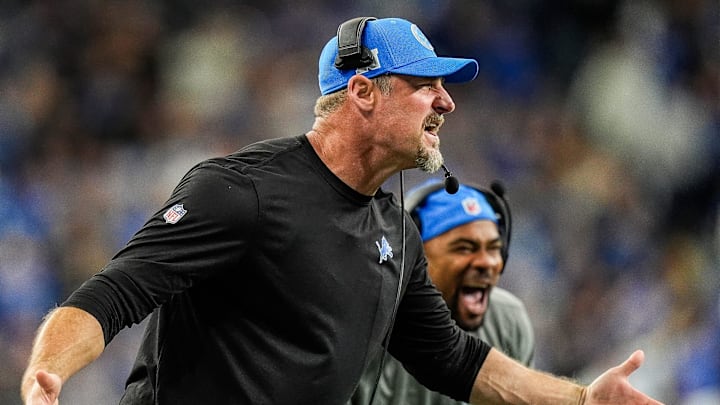 Detroit Lions head coach Dan Campbell celebrates a play against Tennessee Titans next to wide receivers coach Antwaan Randle El during the first half at Ford Field in Detroit on Sunday, Oct. 27, 2024.
