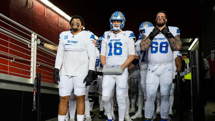 From left, Detroit Lions offensive tackle Penei Sewell (58), quarterback Jared Goff (16) and offensive tackle Taylor Decker (68), ready to take the field against the San Francisco 49ers at Levi's Stadium in Santa Clara, Calif. on Monday, Dec. 30, 2024.
