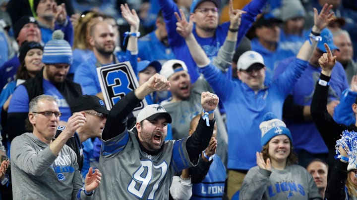 Lions fans react to a play in the first half against the L.A. Rams at Ford Field in Detroit on Sunday, Jan. 14, 2024.