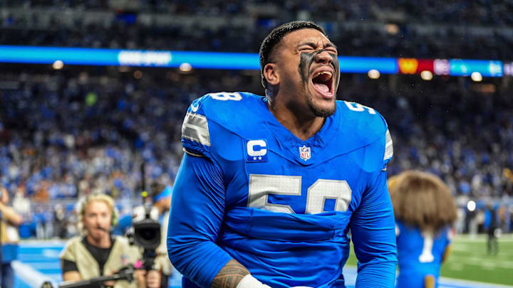 Detroit Lions offensive tackle Penei Sewell (58) yells out after warming up before the game against the Washington Commanders at Ford Field in Detroit, Saturday, Jan. 18, 2025.