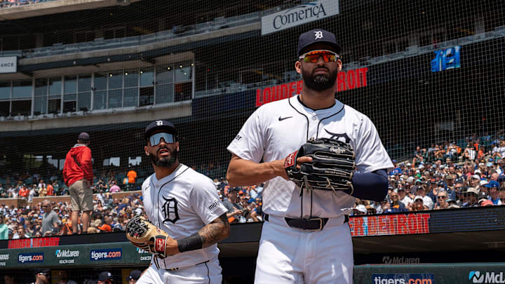 Detroit Tigers second baseman Gleyber Torres, left, (25) takes the field alongside left fielder Riley Greene (31) during their game against the Chicago Cubs at Comerica Park in Detroit on Saturday, June 7, 2025.