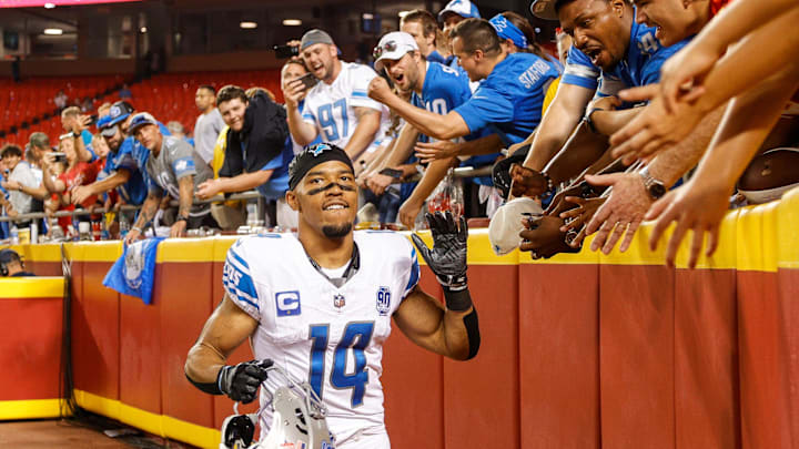 Detroit Lions wide receiver Amon-Ra St. Brown (14) high fives fans after 21-20 win over Kansas City Chiefs at Arrowhead Stadium in Kansas City, Mo. on Thursday, Sept. 7, 2023.