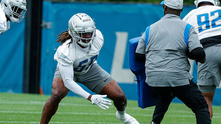 Lions linebacker James Houston, center, practices during minicamp in Allen Park on Wednesday, June 8, 2022.