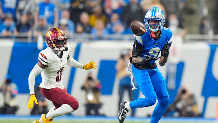 Detroit Lions wide receiver Jameson Williams looks to catch the ball against Washington Commanders cornerback Mike Sainristil in the first quarter in the NFC divisional round at Ford Field in Detroit on Saturday, Jan. 18, 2025.