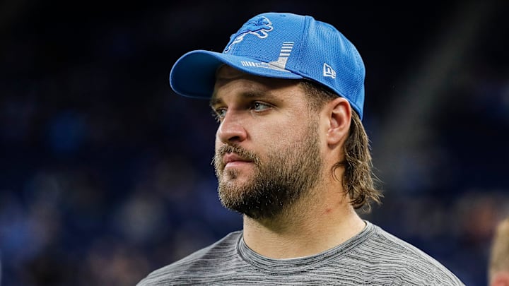 Detroit Lions offensive tackle Taylor Decker (68) walks along the sideline during warmups before the Baltimore Ravens game Ford Field in Detroit on Sunday, Sept. 26, 2021.