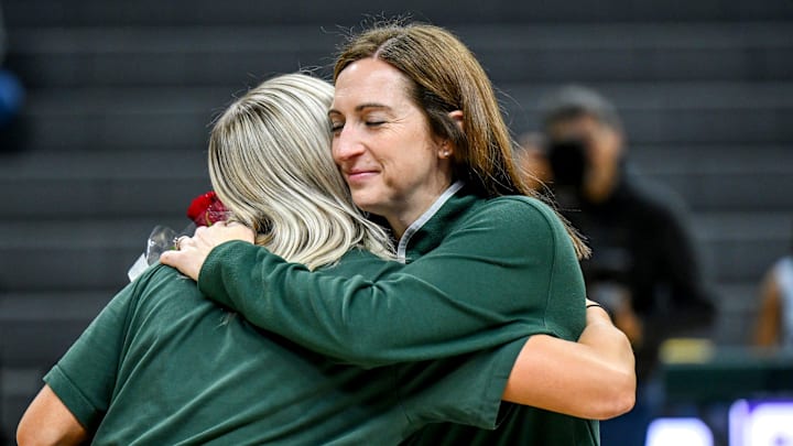 Michigan State's head coach Robyn Fralick, right, hugs Theryn Hallock during the senior night ceremony after MSU's win over Northwestern on Wednesday, Feb. 18, 2026, at the Breslin Center in East Lansing. Michigan State's head coach Robyn Fralick, right, hugs Theryn Hallock during the senior night ceremony after MSU's win over Northwestern on Wednesday, Feb. 18, 2026, at the Breslin Center in East Lansing.