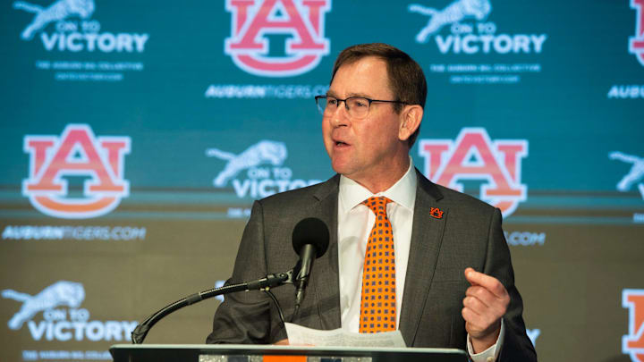 Auburn athletic director John Cohen introduces Auburn Tigers football coach Hugh Freeze at the