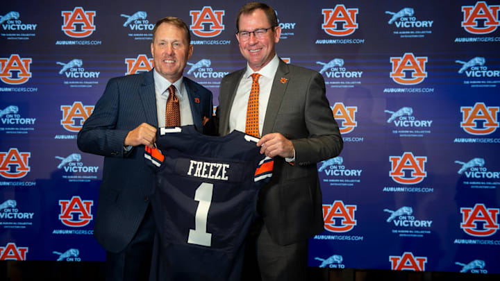 Auburn Tigers football coach Hugh Freeze and athletic director John Cohen pose for photos during Freeze   s introduction at the Woltosz Football Performance Center in Auburn, Ala., on Tuesday, Nov. 29, 2022