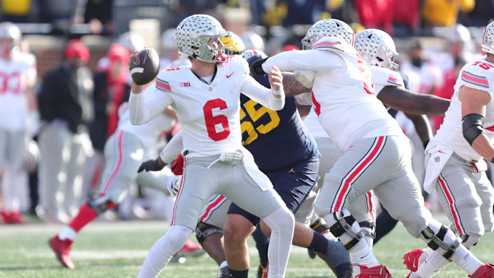 Nov 25, 2023; Ann Arbor, MI, USA;  Ohio State quarterback Kyle McCord makes a pass against Ohio
